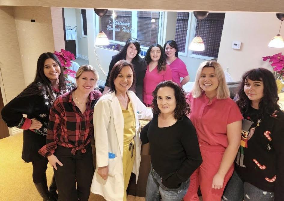 Dr. Li Fan with her providers and caring office team
